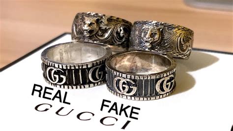 fake gucci ring vs real|how to tell if gucci bag is real.